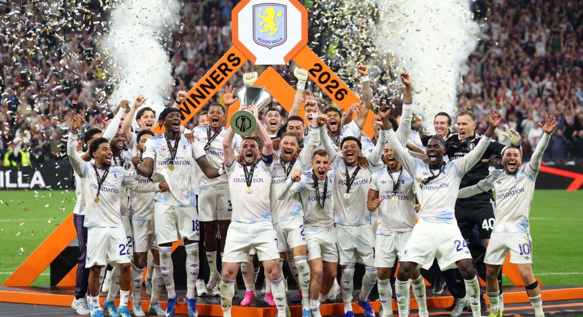 Aston Villa's Scottish midfielder #07 John McGinn and his teammates celebrate with the trophy after winning the UEFA Europa League final football match between SC Freiburg and Aston Villa at Besiktas Park in Istanbul on May 20, 2026. (Photo by Stefano RELLANDINI / AFP)