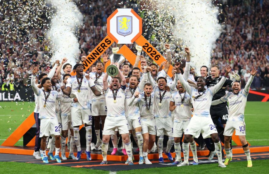 Aston Villa's Scottish midfielder #07 John McGinn and his teammates celebrate with the trophy after winning the UEFA Europa League final football match between SC Freiburg and Aston Villa at Besiktas Park in Istanbul on May 20, 2026. (Photo by Stefano RELLANDINI / AFP)
