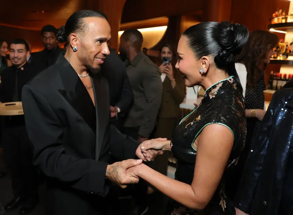 Kim Kardashian and Lewis Hamilton Share Public Kiss at Gala