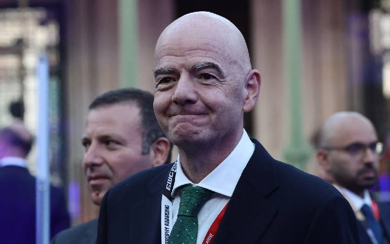 UEFA President Aleksander Ceferin and FIFA President Gianni Infantino amid tensions over global football leadership.