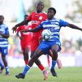 Brian Ojok shields the ball from Alex Kipruto during AFC Leopards’ match against Bandari