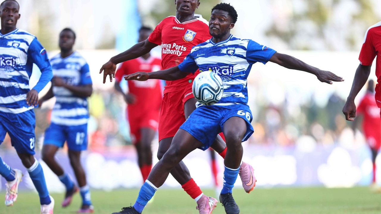 Brian Ojok shields the ball from Alex Kipruto during AFC Leopards’ match against Bandari