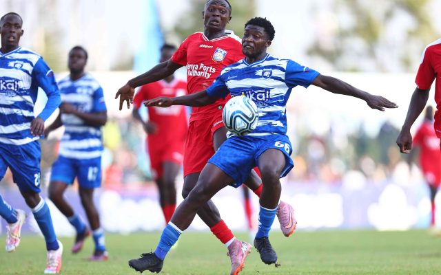 Brian Ojok shields the ball from Alex Kipruto during AFC Leopards’ match against Bandari