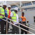 Salim Mvurya and officials inspect construction at Kipchoge Keino Stadium in Eldoret