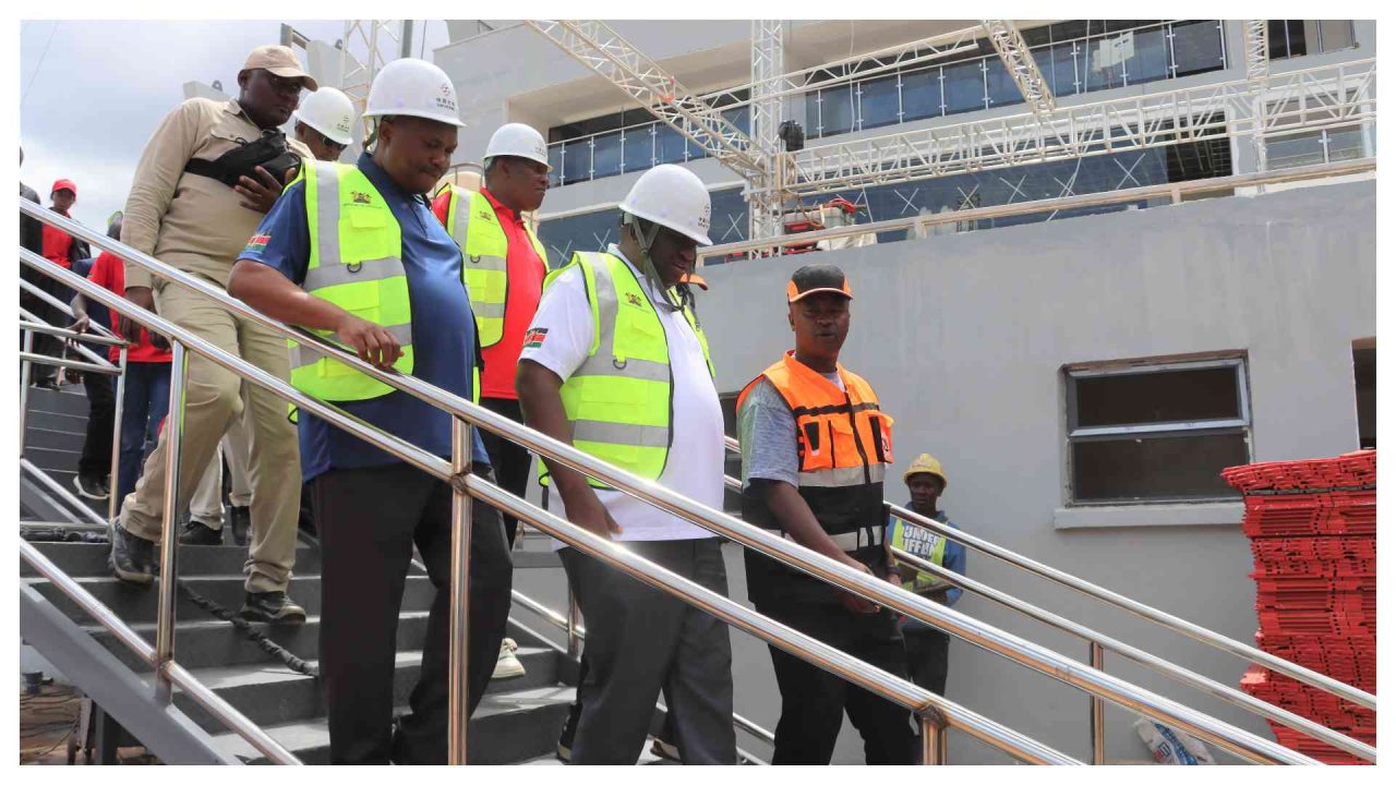 Salim Mvurya and officials inspect construction at Kipchoge Keino Stadium in Eldoret